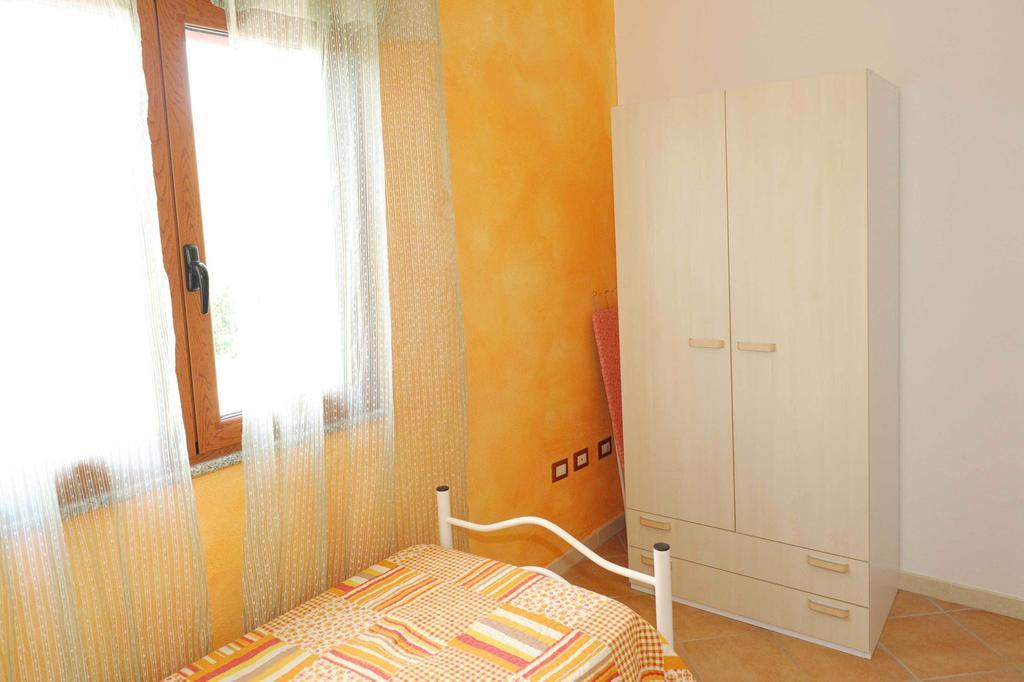 Residence Tanaunella Budoni Szoba fotó